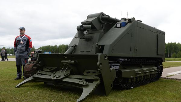 Uran-14, a robotic complex to fight fires at explosion-hazard facilities, is showcased at the Integrated Safety and Security 2017 (ISSE) international exhibition held outside Moscow - Sputnik International