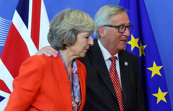 British Prime Minister Theresa May (L) is welcomed by European Commission President Jean-Claude Juncker at the EC headquarters in Brussels, Belgium October 21, 2016. British Prime Minister Theresa May (L) is welcomed by European Commission President Jean-Claude Juncker at the EC headquarters in Brussels, Belgium October 21, 2016. - Sputnik International
