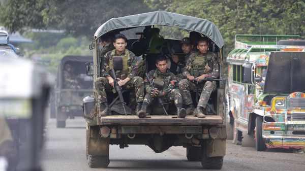 In this June 9, 2017, photo, soldiers ride a military vehicle on the outskirts of Marawi city, southern Philippines. The Philippine military says 13 marines have been killed in fierce fighting with Muslim militants who have laid siege to southern Marawi city. - Sputnik International