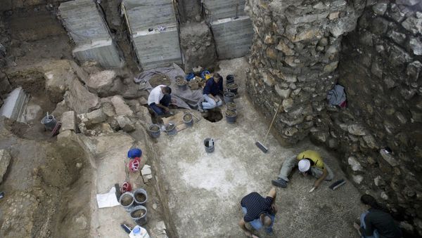 Workers of the Israeli Antiquities Authority work at an excavation site in Jerusalem's Old City. (File) Workers of the Israeli Antiquities Authority work at an excavation site in Jerusalem's Old City. (File) - Sputnik International