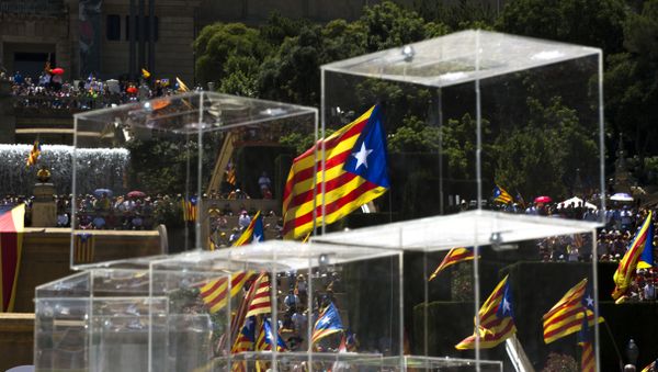 People wave pro independence flags next to ballot boxes during a protest organised by the National Assembly for Catalonia, to support the call for referendum in Barcelona, Spain - Sputnik International