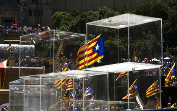 People wave pro independence flags next to ballot boxes during a protest organised by the National Assembly for Catalonia, to support the call for referendum in Barcelona, Spain People wave pro independence flags next to ballot boxes during a protest organised by the National Assembly for Catalonia, to support the call for referendum in Barcelona, Spain - Sputnik International