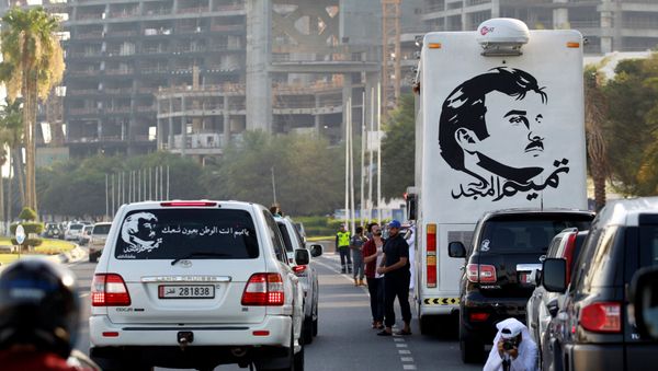 A painting depicting Qatar’s Emir Sheikh Tamim Bin Hamad Al-Thani is seen on a bus during a demonstration in support of him in Doha, Qatar June 11, 2017 A painting depicting Qatar’s Emir Sheikh Tamim Bin Hamad Al-Thani is seen on a bus during a demonstration in support of him in Doha, Qatar June 11, 2017 - Sputnik International