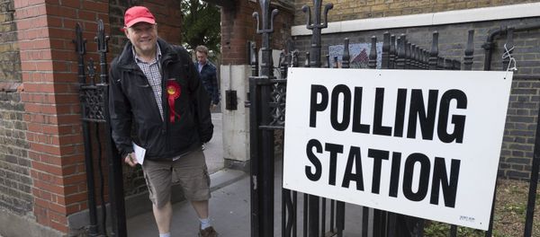 A supporter of the Labour Party leaves a polling station in London after voting the United Kingdom general election of 2017 - Sputnik International