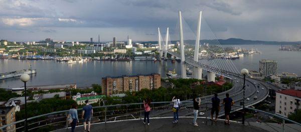 People watch a bridge over the Golden Horn bay from a viewpoint in Vladivostok, Russia, June 8, 2017 People watch a bridge over the Golden Horn bay from a viewpoint in Vladivostok, Russia, June 8, 2017 - Sputnik International