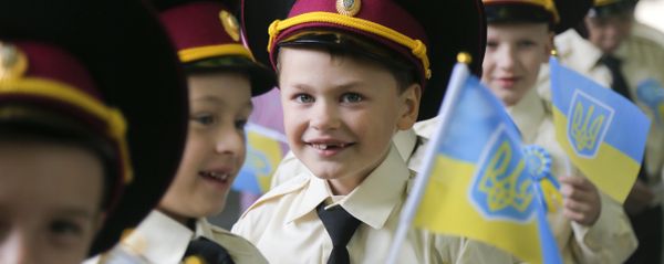 Seven-year old cadets hold Ukrainian flags as they attend a ceremony on the occasion of the first day of school at a cadet lyceum in Kiev, Ukraine, Thursday, Sept. 1, 2016 Seven-year old cadets hold Ukrainian flags as they attend a ceremony on the occasion of the first day of school at a cadet lyceum in Kiev, Ukraine, Thursday, Sept. 1, 2016 - Sputnik International