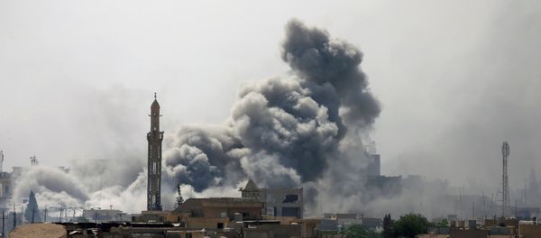 Smoke rises from an airstrike during a battle between Iraqi forces and Islamic State militants in western Mosul, Iraq, May 21, 2017 Smoke rises from an airstrike during a battle between Iraqi forces and Islamic State militants in western Mosul, Iraq, May 21, 2017 - Sputnik International