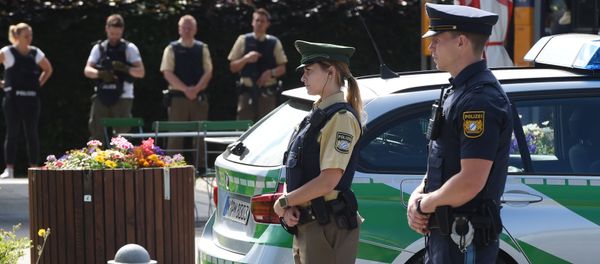 Police officers secure the area around a commuter rail station in Unterfoehring near Munich, southern Germany, where shots were fired on June 13, 2017 Police officers secure the area around a commuter rail station in Unterfoehring near Munich, southern Germany, where shots were fired on June 13, 2017 - Sputnik International