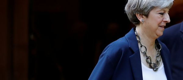 Britain's Prime Minister Theresa May leaves after a church service in Sonning, Britain June 11, 2017. Britain's Prime Minister Theresa May leaves after a church service in Sonning, Britain June 11, 2017. - Sputnik International