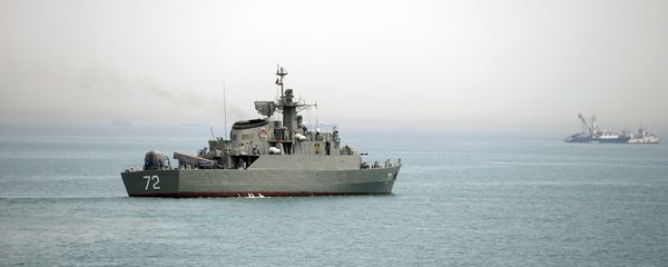 In this Tuesday, April 7, 2015, file photo released by the semi-official Fars News Agency, Iranian warship Alborz, foreground, prepares before leaving Iran's waters, at the Strait of Hormuz - Sputnik International