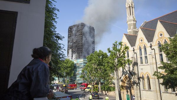 Smoke billows from a high-rise apartment building on fire in London, Wednesday, June 14, 2017 Smoke billows from a high-rise apartment building on fire in London, Wednesday, June 14, 2017 - Sputnik International