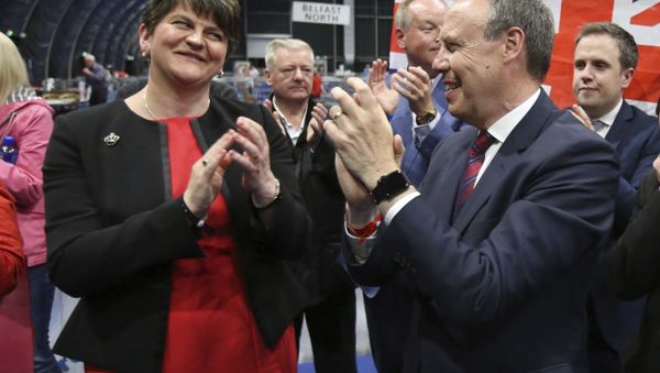 Democratic Unionist Party (DUP) leader Arlene Foster, left, and deputy leader Nigel Dodds cheer as Emma Little Pengelly is elected to the South Belfast constituency at the Titanic exhibition centre in Belfast where counting is taking place in the general election, Friday June 9, 2017. - Sputnik International