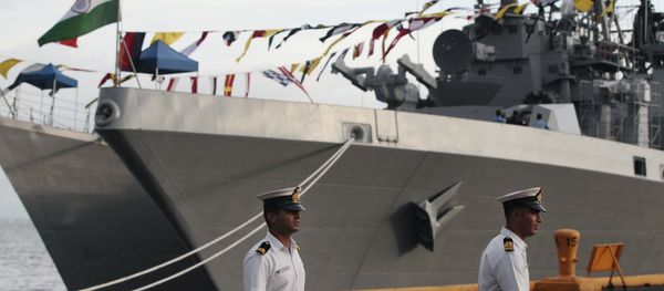 Indian sailors walk beside Indian Navy ships, from left, INS Ranvijay (D55), a Rajput class destroyer, and INS Saptura, a Shivalik-class stealth multi-role frigate, as they arrive at Berth 15, South Harbour, in Manila, Philippines on Wednesday, June 12, 2013 Indian sailors walk beside Indian Navy ships, from left, INS Ranvijay (D55), a Rajput class destroyer, and INS Saptura, a Shivalik-class stealth multi-role frigate, as they arrive at Berth 15, South Harbour, in Manila, Philippines on Wednesday, June 12, 2013 - Sputnik International