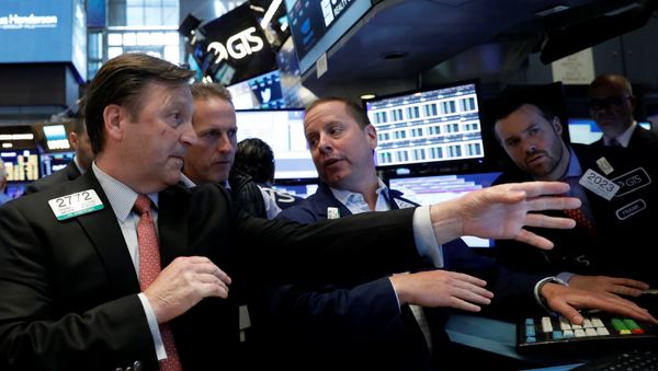 Traders work on the floor of the New York Stock Exchange (NYSE) in New York, U.S., June 2, 2017 Traders work on the floor of the New York Stock Exchange (NYSE) in New York, U.S., June 2, 2017 - Sputnik International