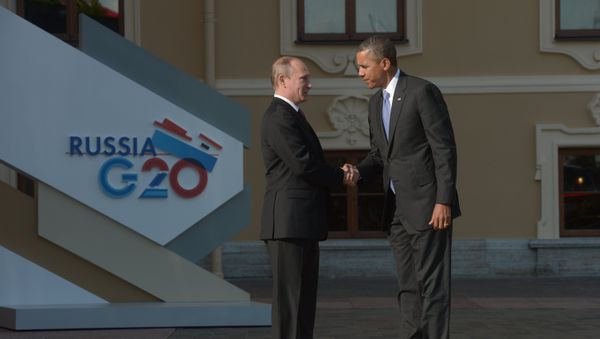 Russian President Vladimir Putin, left, and President of the United States of America Barack Obama during the official welcome of heads of delegations of G20 member states, invited countries, and international organizations. File photo - Sputnik International