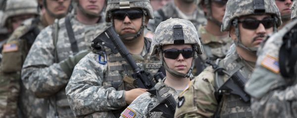 U.S. soldiers attend an opening ceremony of military exercise 'Iron Wolf 2017', at the training range in Pabrade, north of the capital Vilnius, Lithuania on Monday, June 12, 2017 U.S. soldiers attend an opening ceremony of military exercise 'Iron Wolf 2017', at the training range in Pabrade, north of the capital Vilnius, Lithuania on Monday, June 12, 2017 - Sputnik International
