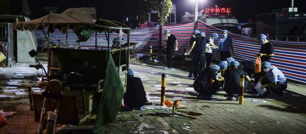Investigators work early Friday, June 16, 2017, at the scene of an explosion outside a kindergarten in Fengxian County in eastern China's Jiangsu Province Investigators work early Friday, June 16, 2017, at the scene of an explosion outside a kindergarten in Fengxian County in eastern China's Jiangsu Province - Sputnik International