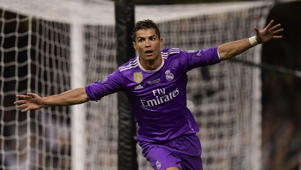 Real Madrid's Portuguese striker Cristiano Ronaldo celebrates after scoring their third goal during the UEFA Champions League final football match between Juventus and Real Madrid at The Principality Stadium in Cardiff, south Wales Real Madrid's Portuguese striker Cristiano Ronaldo celebrates after scoring their third goal during the UEFA Champions League final football match between Juventus and Real Madrid at The Principality Stadium in Cardiff, south Wales - Sputnik International