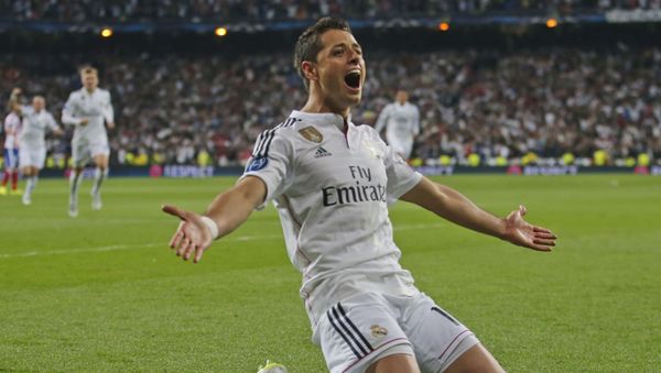 Real Madrid's Chicharito celebrates scoring his side's first goal during the second leg quarterfinal Champions League soccer match between Real Madrid and Atletico Madrid at Santiago Bernabeu stadium in Madrid, Spain - Sputnik International