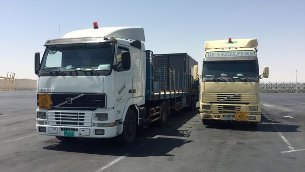 Trucks are seen at the Abu Samra border crossing with Saudi Arabia, in Qatar - Sputnik International