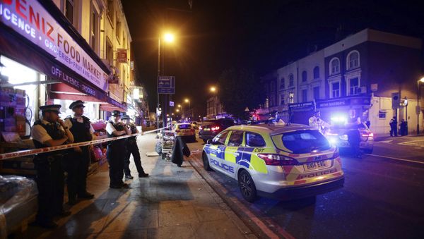 Police man a cordon at Finsbury Park where a vehicle struck pedestrians in London Monday, June 19, 2017. Police say a vehicle struck pedestrians on a road in north London, leaving several casualties and one person has been arrested. - Sputnik International