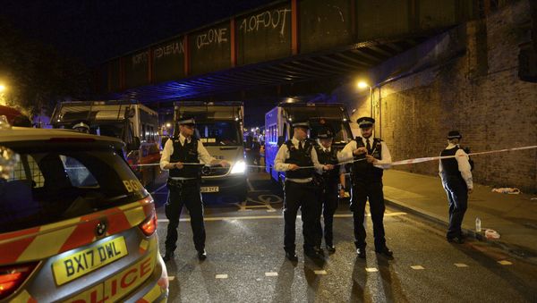 Police officers man a cordon at Finsbury Park where a vehicle struck pedestrians in London Monday, June 19, 2017. Police say a vehicle struck pedestrians on a road in north London, leaving several casualties and one person has been arrested. - Sputnik International