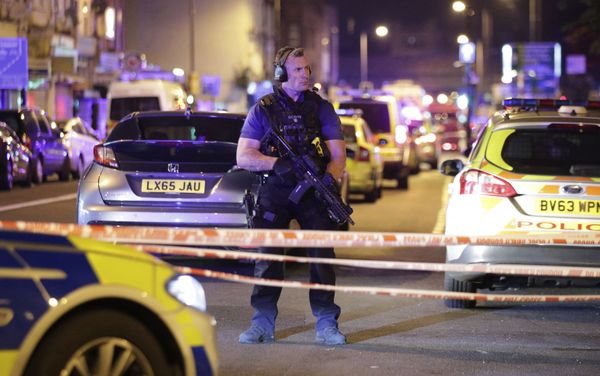 An armed police officer mans a cordon on the Seven Sisters Road at Finsbury Park where a vehicle struck pedestrians in London Monday, June 19, 2017. Police say a vehicle struck pedestrians on a road in north London, leaving several casualties and one person has been arrested. - Sputnik International