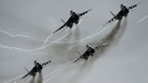 MiG-29 multipurpose fighter aircraft of the Swifts aerobatic team participate in an airshow at the Kubinka air base during the international military-technical forum ARMY-2016. (File) MiG-29 multipurpose fighter aircraft of the Swifts aerobatic team participate in an airshow at the Kubinka air base during the international military-technical forum ARMY-2016. (File) - Sputnik International