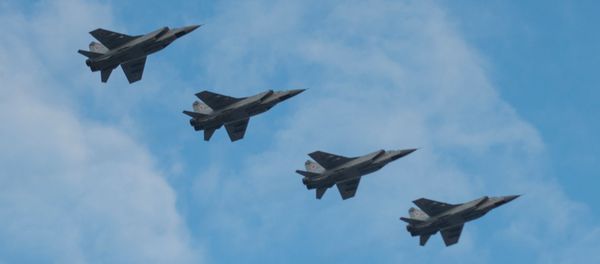 Mikoyan MIG-31 interceptor jets in air over St.Petersburg's Palace Square during an air display rehearsal for the May 9 Victory Parade - Sputnik International