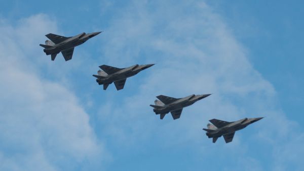 Mikoyan MIG-31 interceptor jets in air over St.Petersburg's Palace Square during an air display rehearsal for the May 9 Victory Parade - Sputnik International