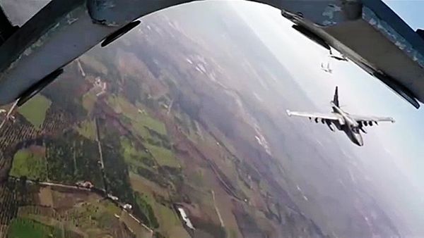 Russia's Su-25 aircraft take off from Hmeimim airbase escorted by Syria's MiG-29 fighter jets. (File) - Sputnik International