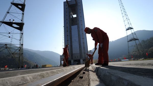 Chinese workers make final preparations to the launch pad at the Xichang Satellite Launch Centre in the southwestern province of Sichuan. (File) Chinese workers make final preparations to the launch pad at the Xichang Satellite Launch Centre in the southwestern province of Sichuan. (File) - Sputnik International