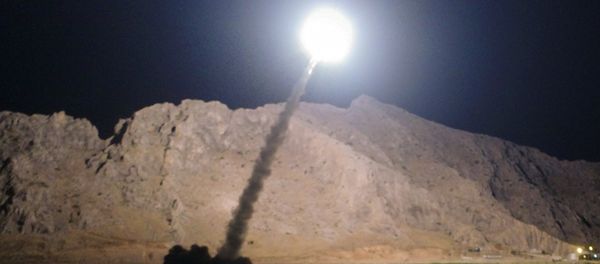 In this picture released by the Iranian state-run IRIB News Agency on Monday, June 19, 2017, a missile is fired from city of Kermanshah in western Iran targeting the Islamic State group in Syria - Sputnik International