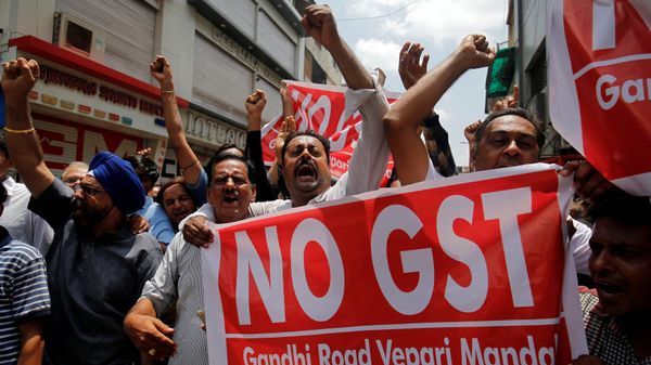 Traders shout slogans during a day-long strike against Goods and Services Tax (GST), set to be launched from July 1, in Ahmedabad, India, June 15, 2017 Traders shout slogans during a day-long strike against Goods and Services Tax (GST), set to be launched from July 1, in Ahmedabad, India, June 15, 2017 - Sputnik International