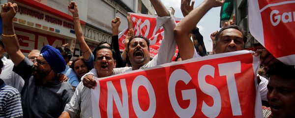 Traders shout slogans during a day-long strike against Goods and Services Tax (GST), set to be launched from July 1, in Ahmedabad, India, June 15, 2017 Traders shout slogans during a day-long strike against Goods and Services Tax (GST), set to be launched from July 1, in Ahmedabad, India, June 15, 2017 - Sputnik International