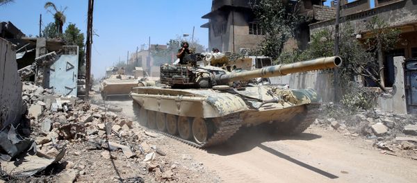 Iraqi military tanks advance towards the Islamic State-held Old City in western Mosul, Iraq June 18, 2017 Iraqi military tanks advance towards the Islamic State-held Old City in western Mosul, Iraq June 18, 2017 - Sputnik International