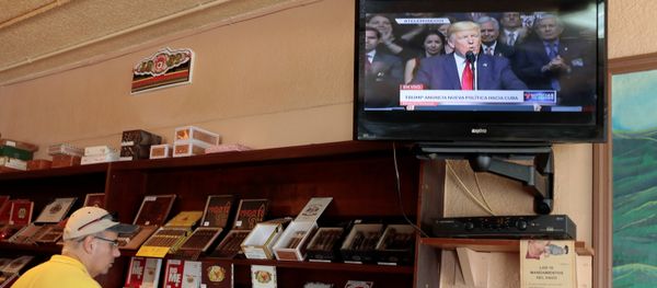 A tourist buys Cuban cigars at the San Roman cigar store in the Little Havana district as U.S. President Donald Trump announces changes to U.S.-Cuba policy, in Miami, Florida, U.S. June 16, 2017 A tourist buys Cuban cigars at the San Roman cigar store in the Little Havana district as U.S. President Donald Trump announces changes to U.S.-Cuba policy, in Miami, Florida, U.S. June 16, 2017 - Sputnik International
