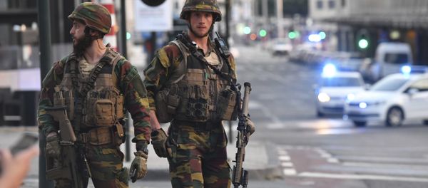 In this image taken from video, police cars create a cordon near the train station in central Brussels, Tuesday June 20, 2017. Belgian media report that explosion-like noises have been heard at a Brussels train station; the main square evacuated. - Sputnik International