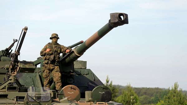 A Polish Army soldier attends the 2017 Iron Wolf exercise in Stasenai, Lithuania, June 20, 2017 A Polish Army soldier attends the 2017 Iron Wolf exercise in Stasenai, Lithuania, June 20, 2017 - Sputnik International