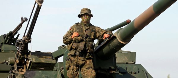 A Polish Army soldier attends the 2017 Iron Wolf exercise in Stasenai, Lithuania, June 20, 2017 - Sputnik International