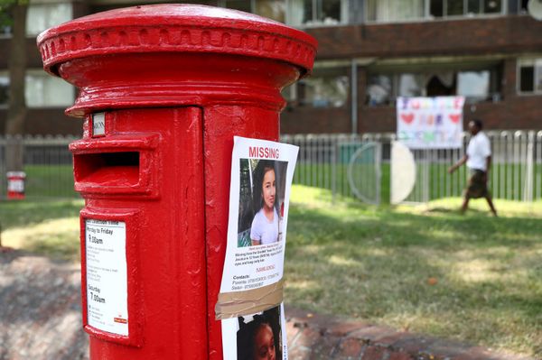 Pictures of people missing in the Grenfell apartment tower fire are seen stuck to a post box in North Kensington, London, Britain, June 18, 2017. - Sputnik International