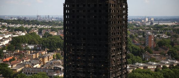 The burnt out remains of the Grenfell apartment tower are seen in North Kensington, London, Britain, June 18, 2017. - Sputnik International