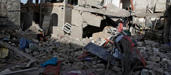 A man sits on the rubble of a house of his relatives, destroyed by a Saudi-led air strike in Sanaa, Yemen June 9, 2017 A man sits on the rubble of a house of his relatives, destroyed by a Saudi-led air strike in Sanaa, Yemen June 9, 2017 - Sputnik International