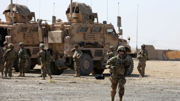 A U.S. soldier runs at a coalition forces forward base near West Mosul, Iraq June 21, 2017, where Iraqi security forces are fighting Islamic State A U.S. soldier runs at a coalition forces forward base near West Mosul, Iraq June 21, 2017, where Iraqi security forces are fighting Islamic State - Sputnik International