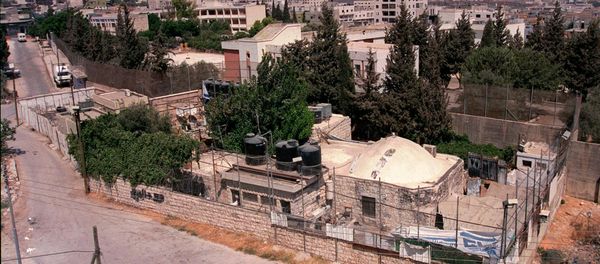 Joseph's Tomb compound is seen from a building in the West Bank city of Nablus. (File) - Sputnik International