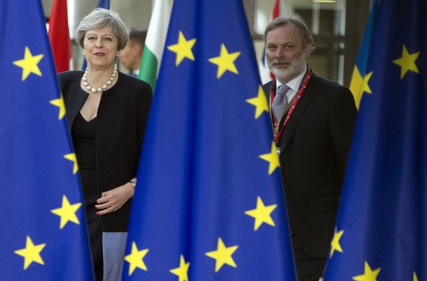 British Prime Minister Theresa May, left, and UK representative to the EU Tim Barrow arrive for an EU summit at the Europa building in Brussels on Thursday, June 22, 2017. British Prime Minister Theresa May, left, and UK representative to the EU Tim Barrow arrive for an EU summit at the Europa building in Brussels on Thursday, June 22, 2017. - Sputnik International