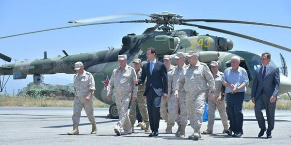 Syria's President Bashar al-Assad visits a Russian air base at Hmeymim, in western Syria in this handout picture posted on SANA on June 27, 2017, Syria.  - Sputnik International