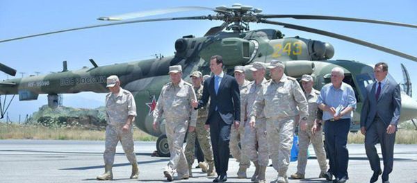 Syria's President Bashar al-Assad visits a Russian air base at Hmeymim, in western Syria in this handout picture posted on SANA on June 27, 2017, Syria. Syria's President Bashar al-Assad visits a Russian air base at Hmeymim, in western Syria in this handout picture posted on SANA on June 27, 2017, Syria. - Sputnik International