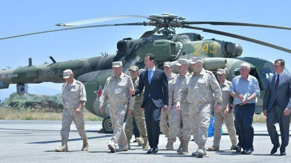 Syria's President Bashar al-Assad visits a Russian air base at Hmeymim, in western Syria in this handout picture posted on SANA on June 27, 2017, Syria. Syria's President Bashar al-Assad visits a Russian air base at Hmeymim, in western Syria in this handout picture posted on SANA on June 27, 2017, Syria. - Sputnik International