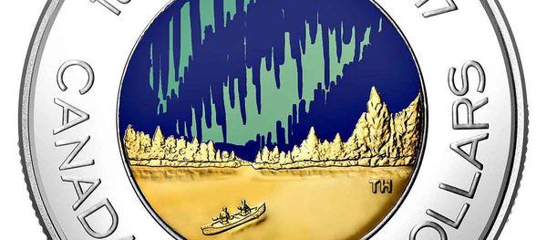 A glow-in-the-dark coin depicting the Aurora Borealis, minted by the Royal Canadian Mint to celebrate the nation's 150th anniversary A glow-in-the-dark coin depicting the Aurora Borealis, minted by the Royal Canadian Mint to celebrate the nation's 150th anniversary - Sputnik International